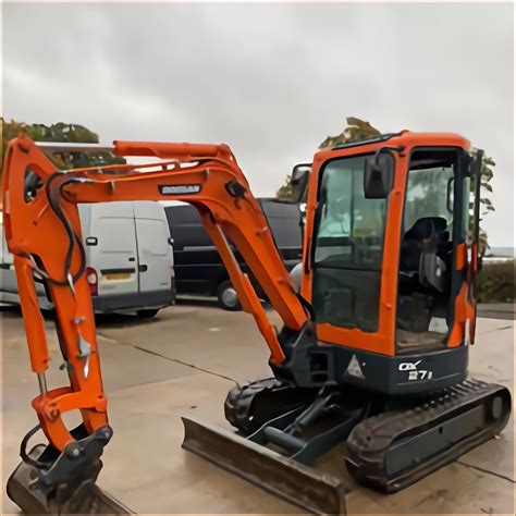 hitachi mini digger manual|1 tonne mini digger.